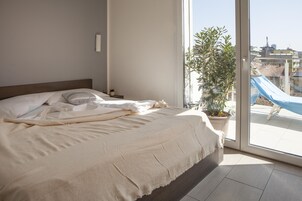 Junior Penthouse, 1 Bedroom, Terrace, Partial Sea View | Premium bedding, in-room safe, soundproofing, free WiFi