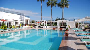 Outdoor pool, pool umbrellas, pool loungers