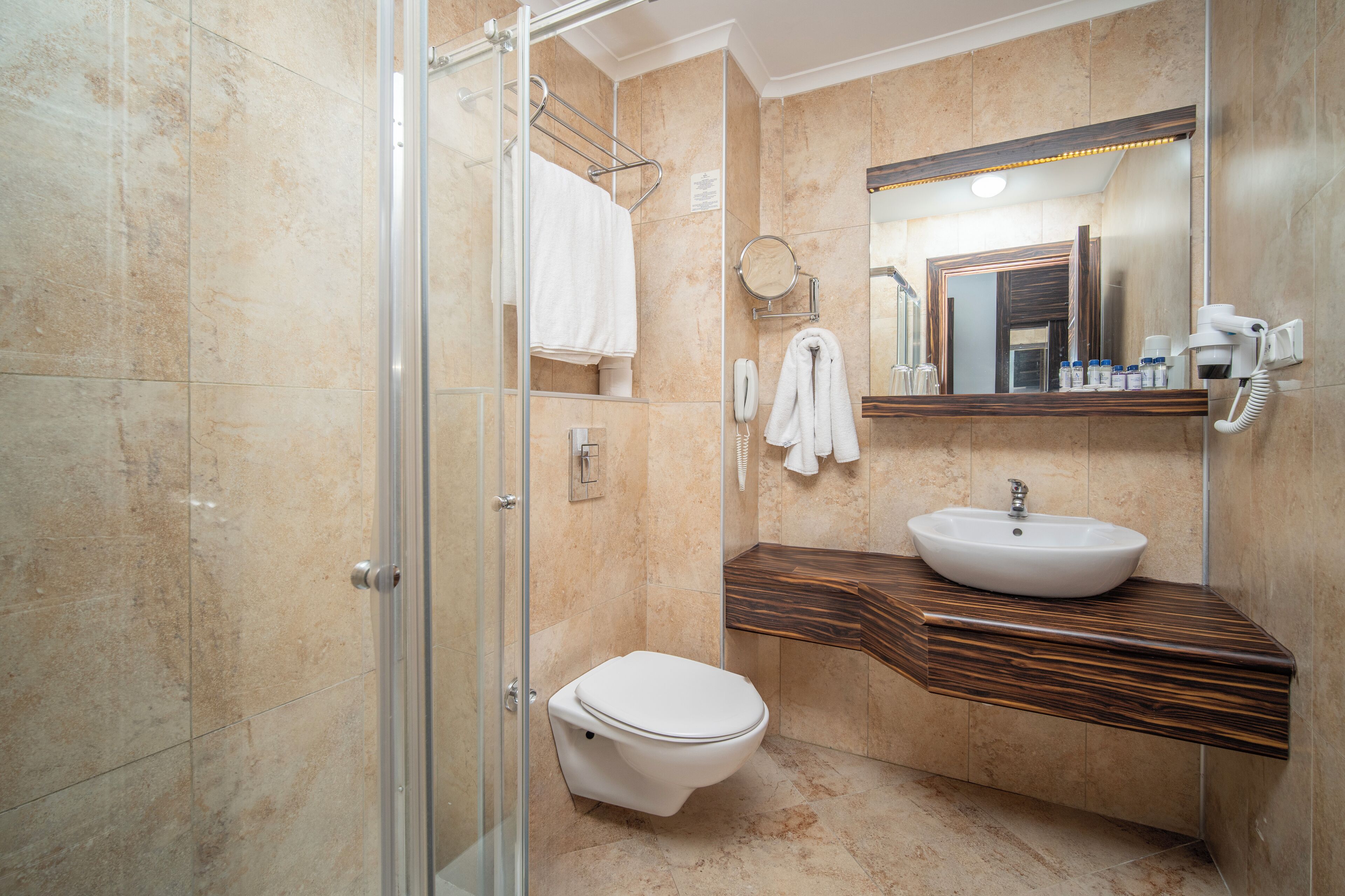 free toiletries, hair dryer, slippers, towels