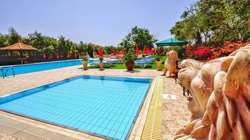 Seasonal outdoor pool, pool umbrellas, sun loungers