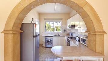 Villa, 2 Bedrooms | Private kitchen | Fridge, microwave, stovetop, coffee/tea maker