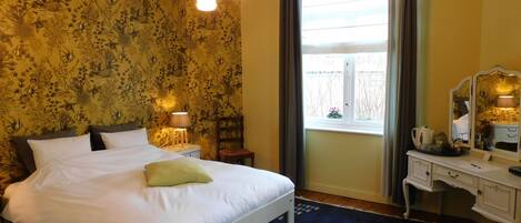 Junior-Suite, 1 Schlafzimmer, Gartenblick | Zimmerausstattung