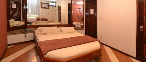 Apartamento standard | Frigobar, individualmente decorados, Wi-Fi de cortesia