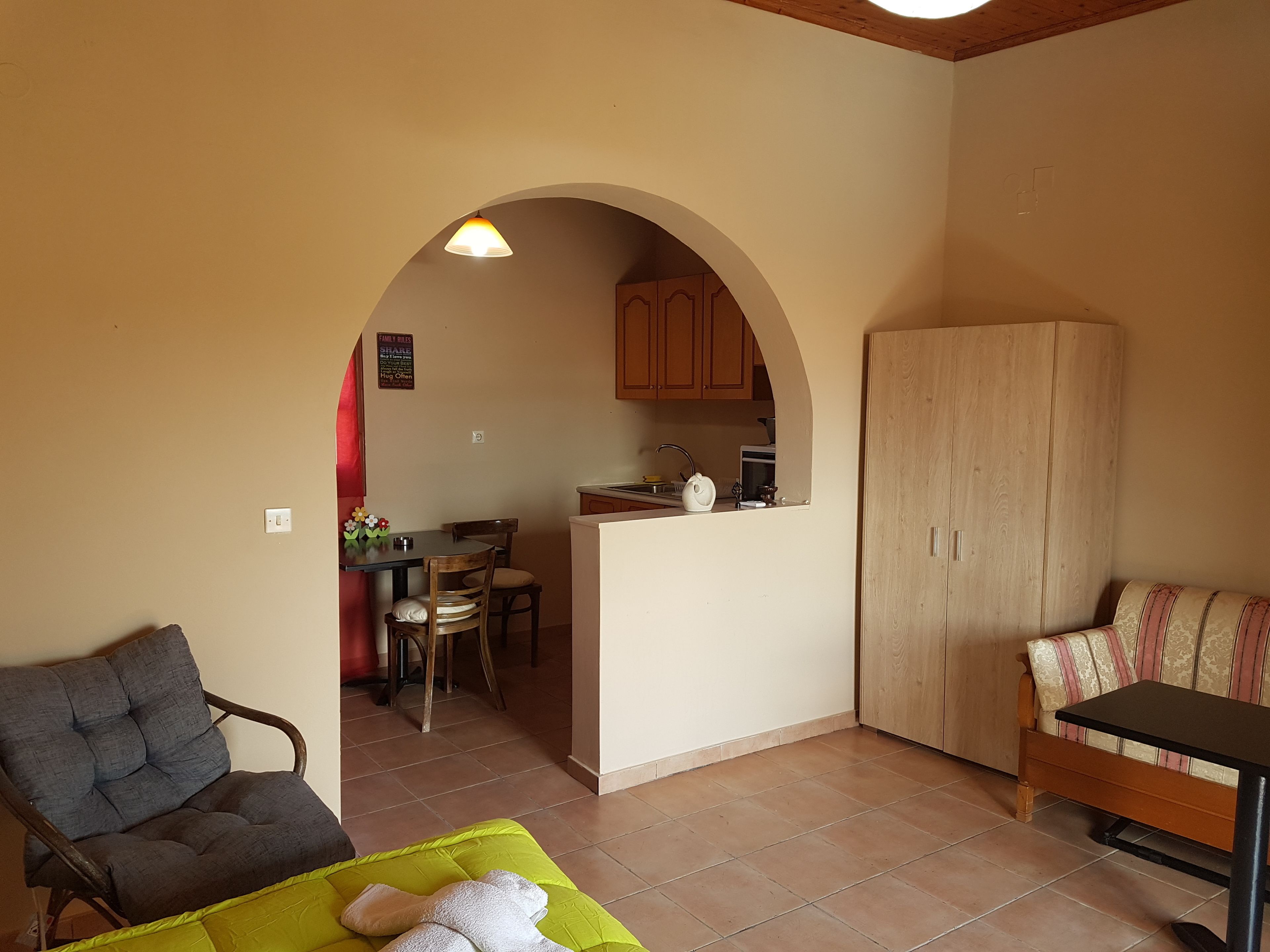 deluxe apartment, 1 bedroom | living area | flat-screen tv