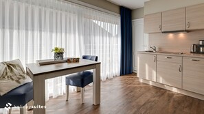 Studio | 2p | Living area | Flat-screen TV - Holiday Suites De Haan (De Haan)