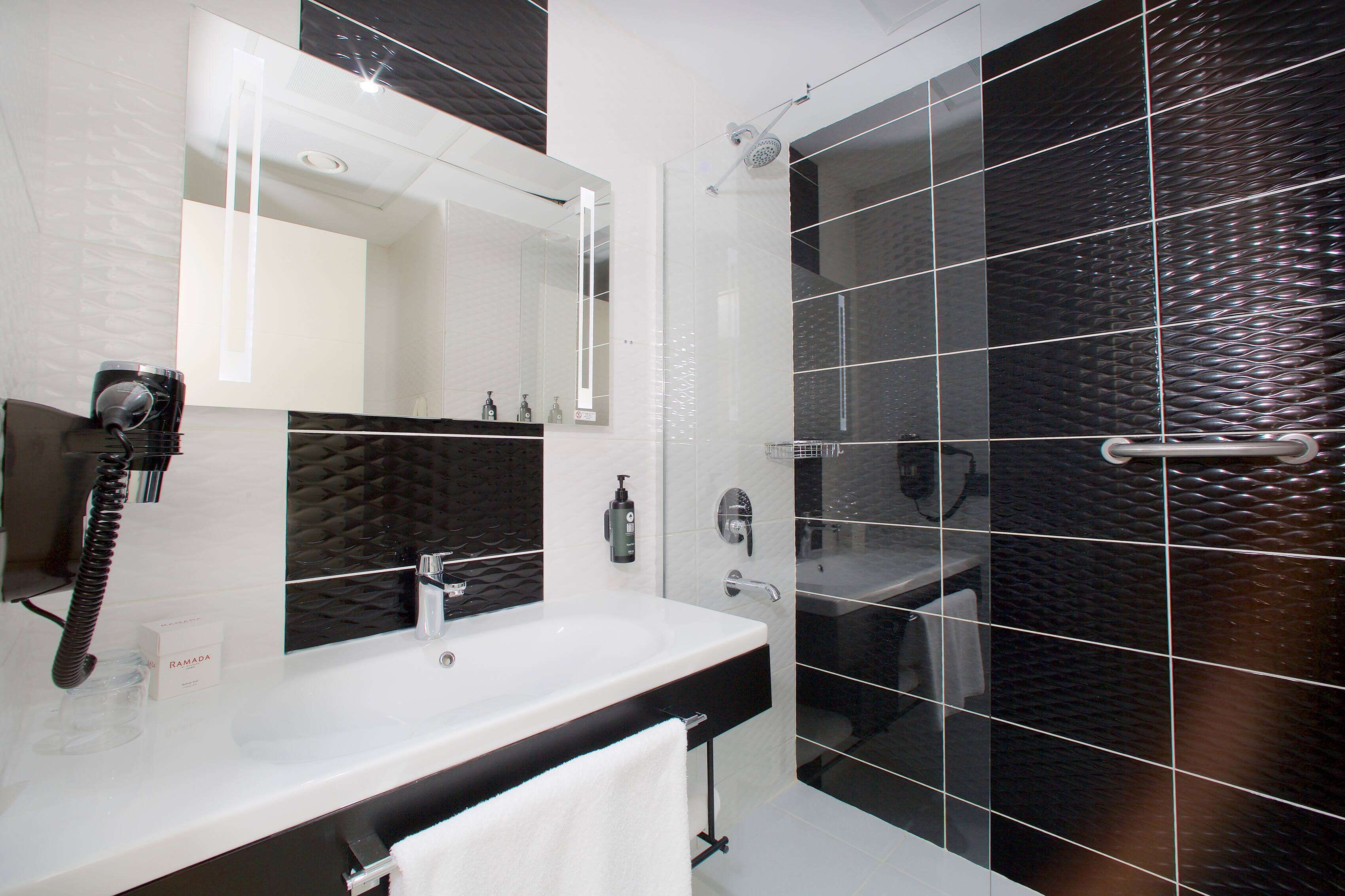 shower, free toiletries, hair dryer, slippers