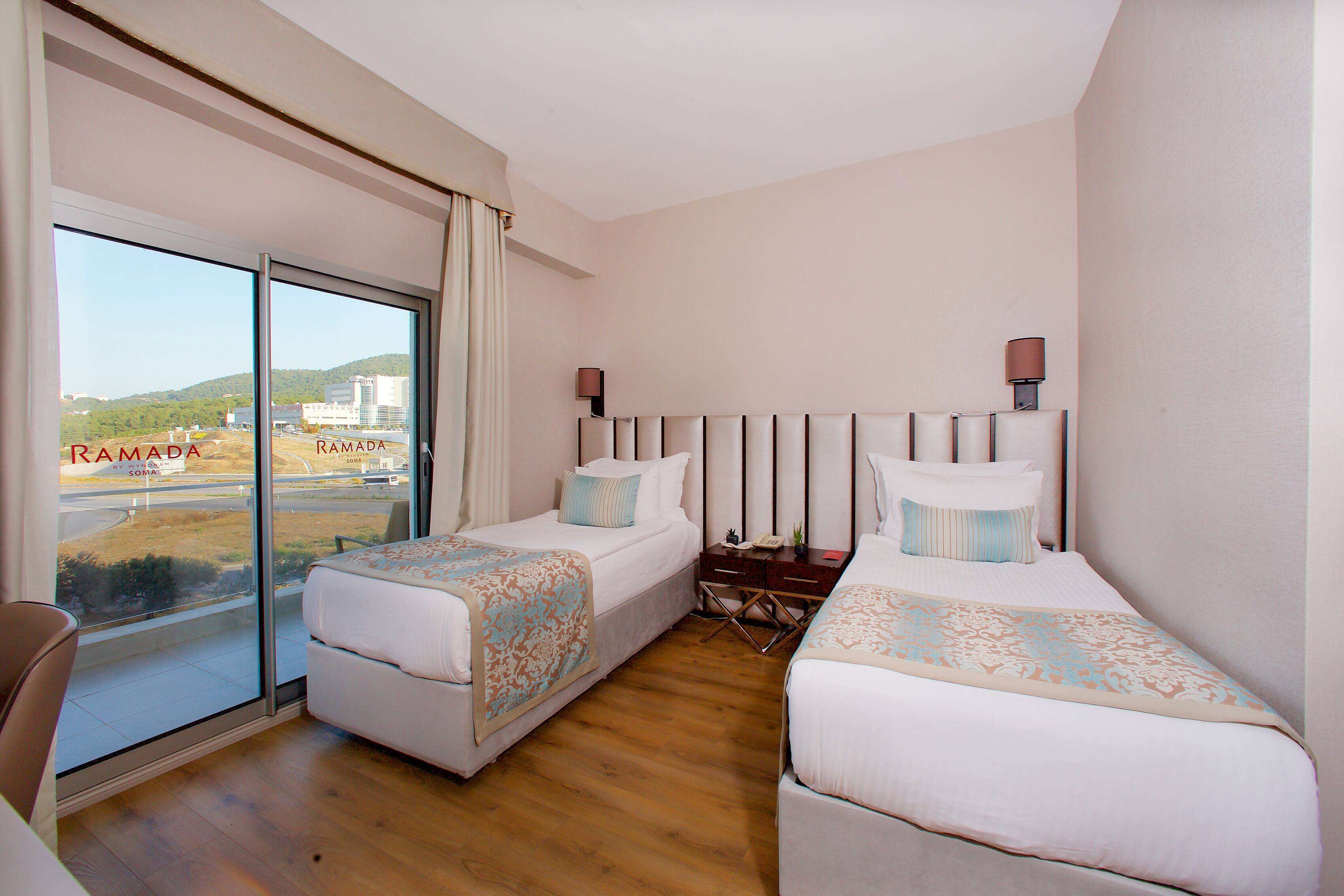 2 twin bed smoking room | minibar, in-room safe, desk, laptop workspace