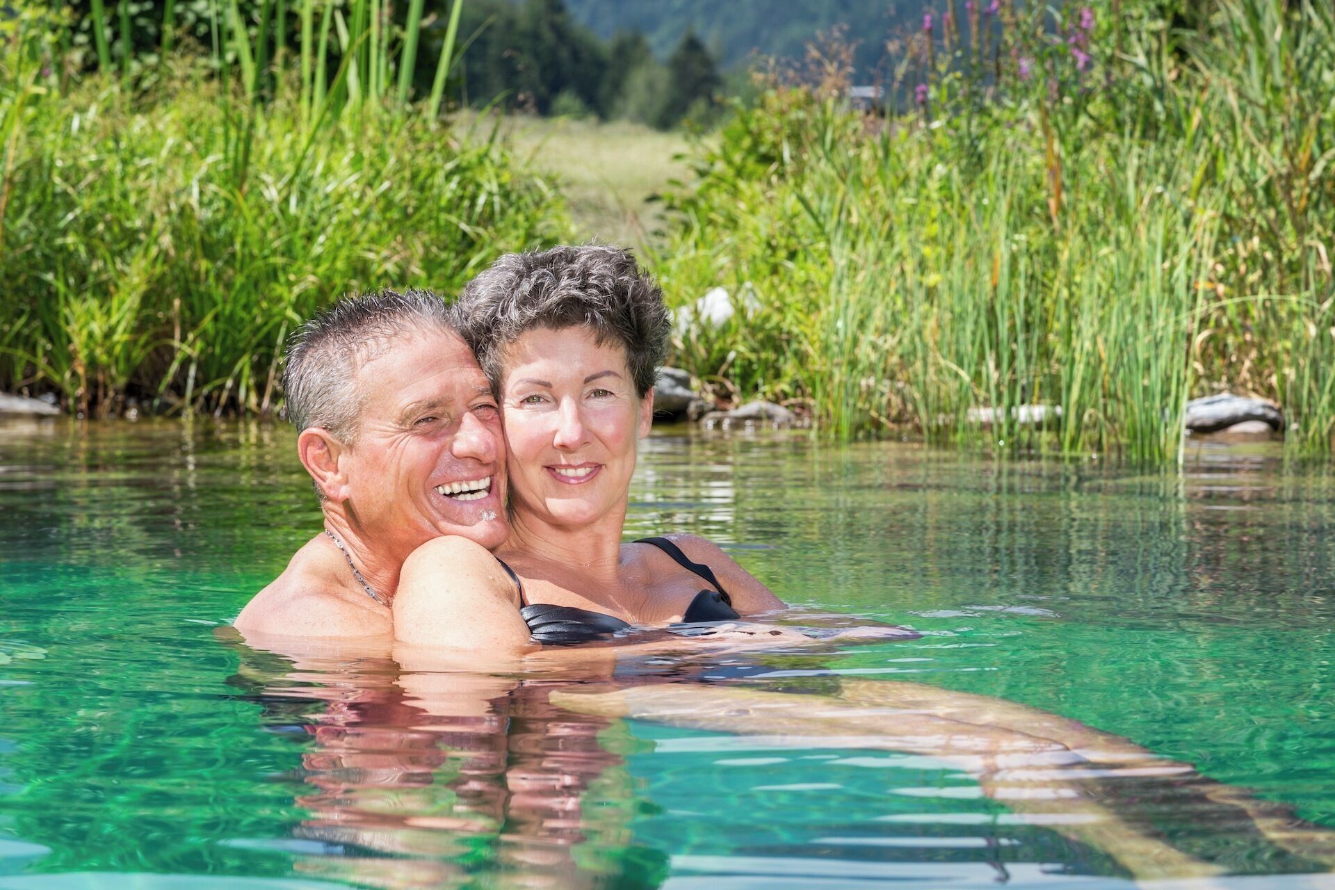 seasonal outdoor pool, pool umbrellas, pool loungers