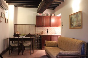 Appartement, 1 chambre | Coin séjour