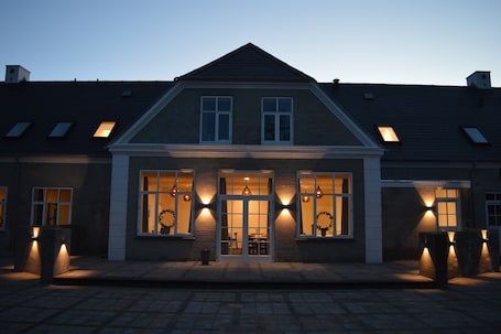 Front of property - evening/night. Femhøj