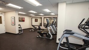 A gym with treadmills, stationary bikes, and elliptical machines. - TownePlace Suites By Marriott Boynton Beach (Boynton Beach)