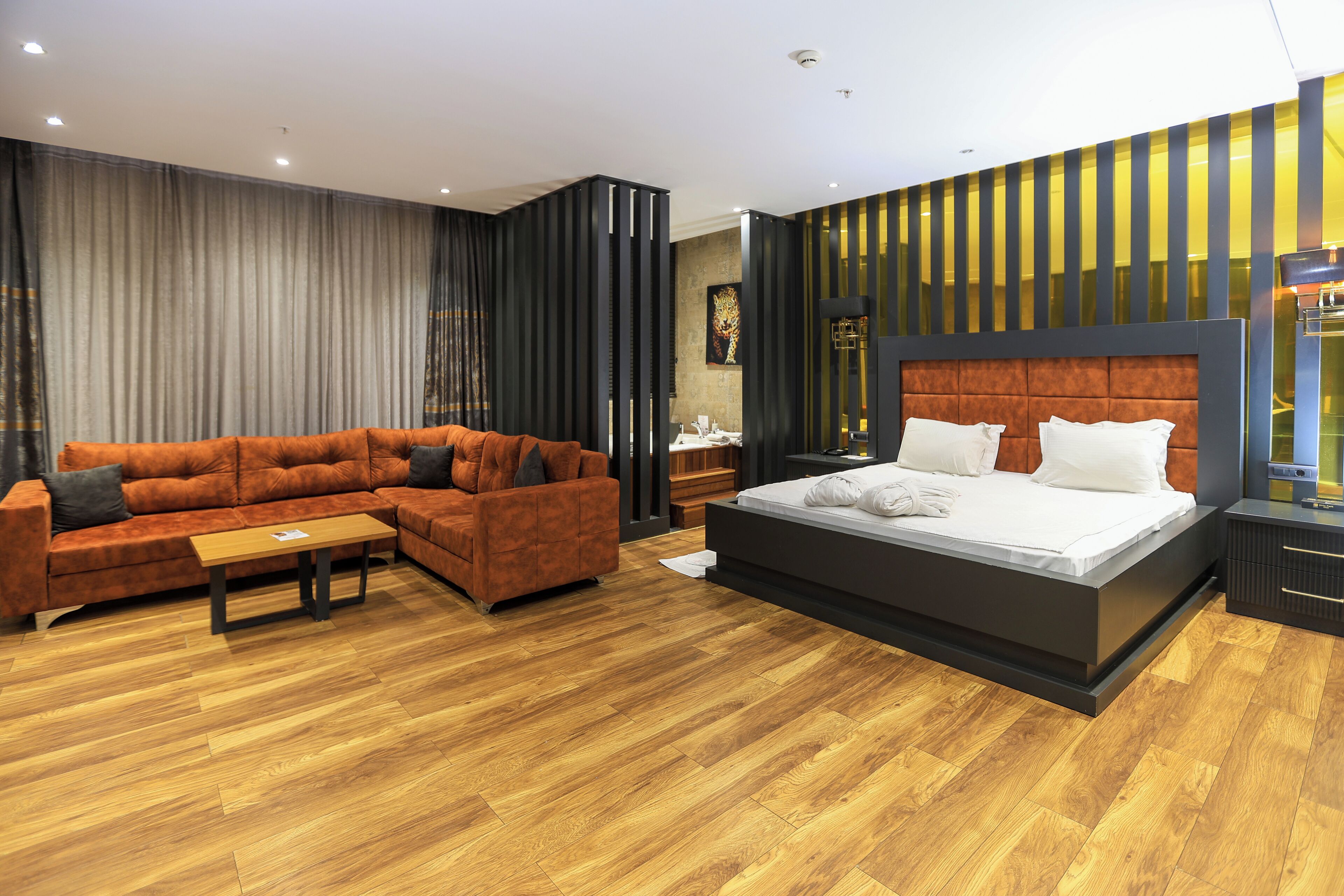 deluxe studio suite | premium bedding, minibar, in-room safe, desk