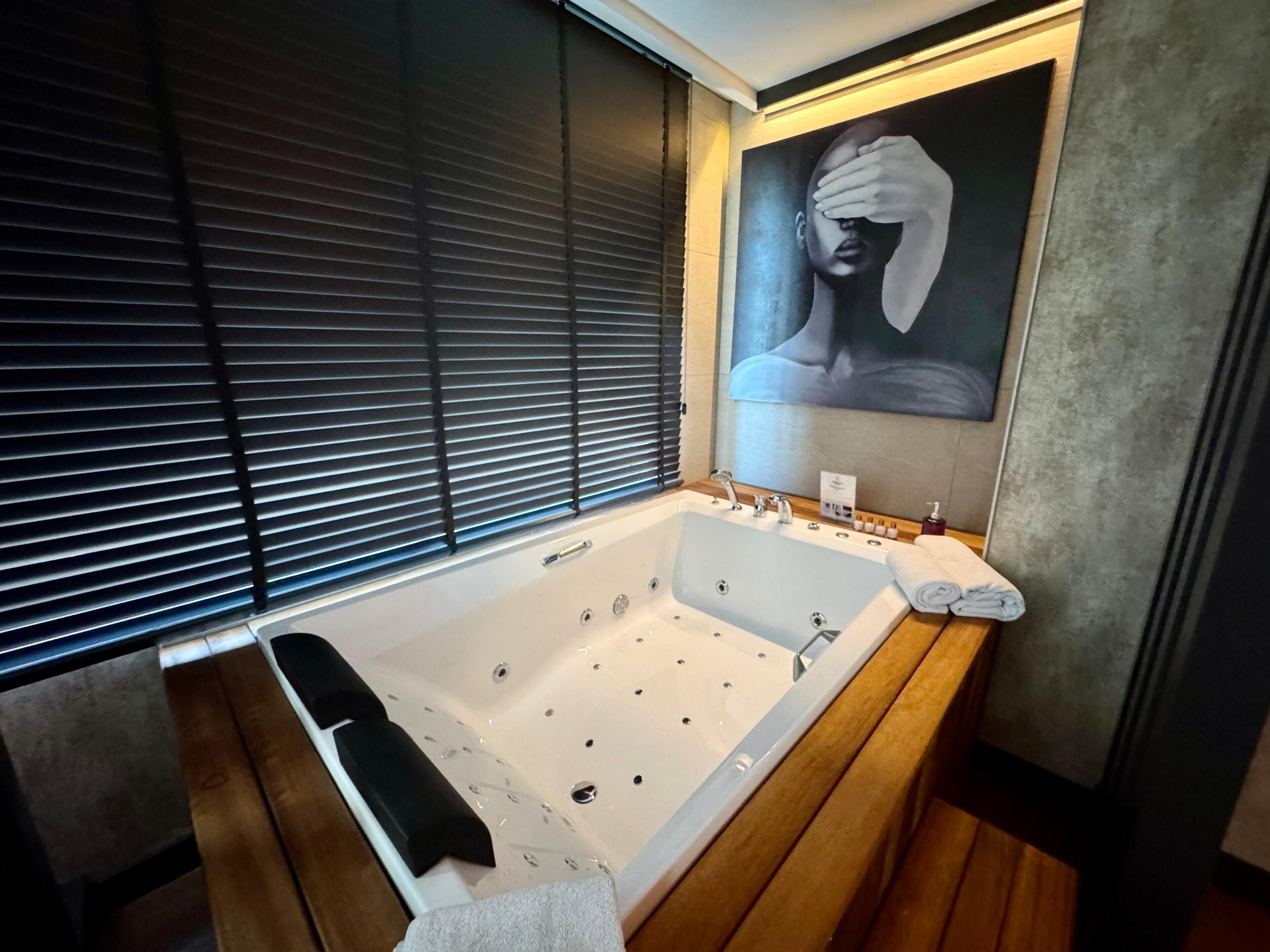 deluxe studio suite | premium bedding, minibar, in-room safe, desk