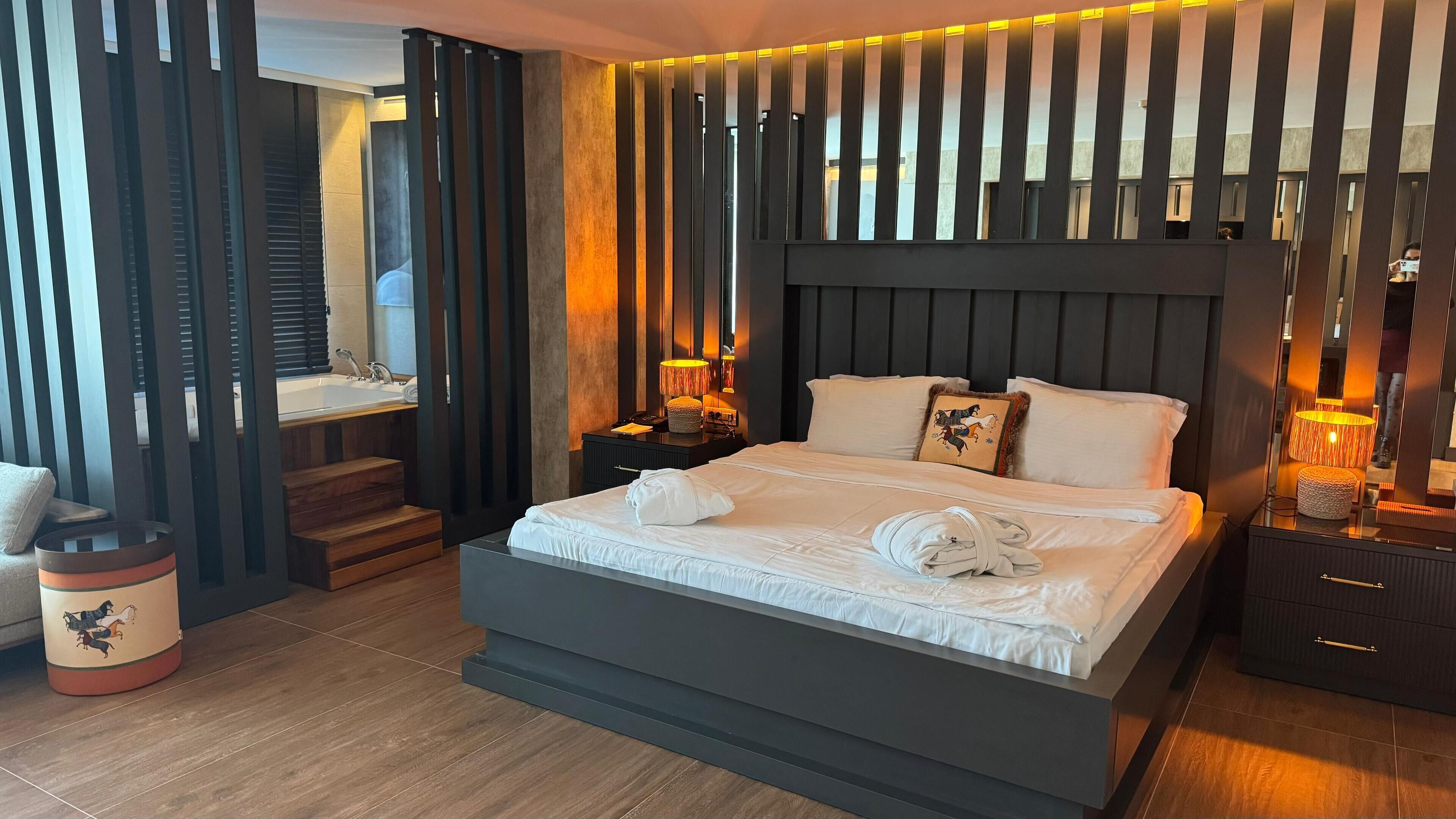 deluxe studio suite | premium bedding, minibar, in-room safe, desk