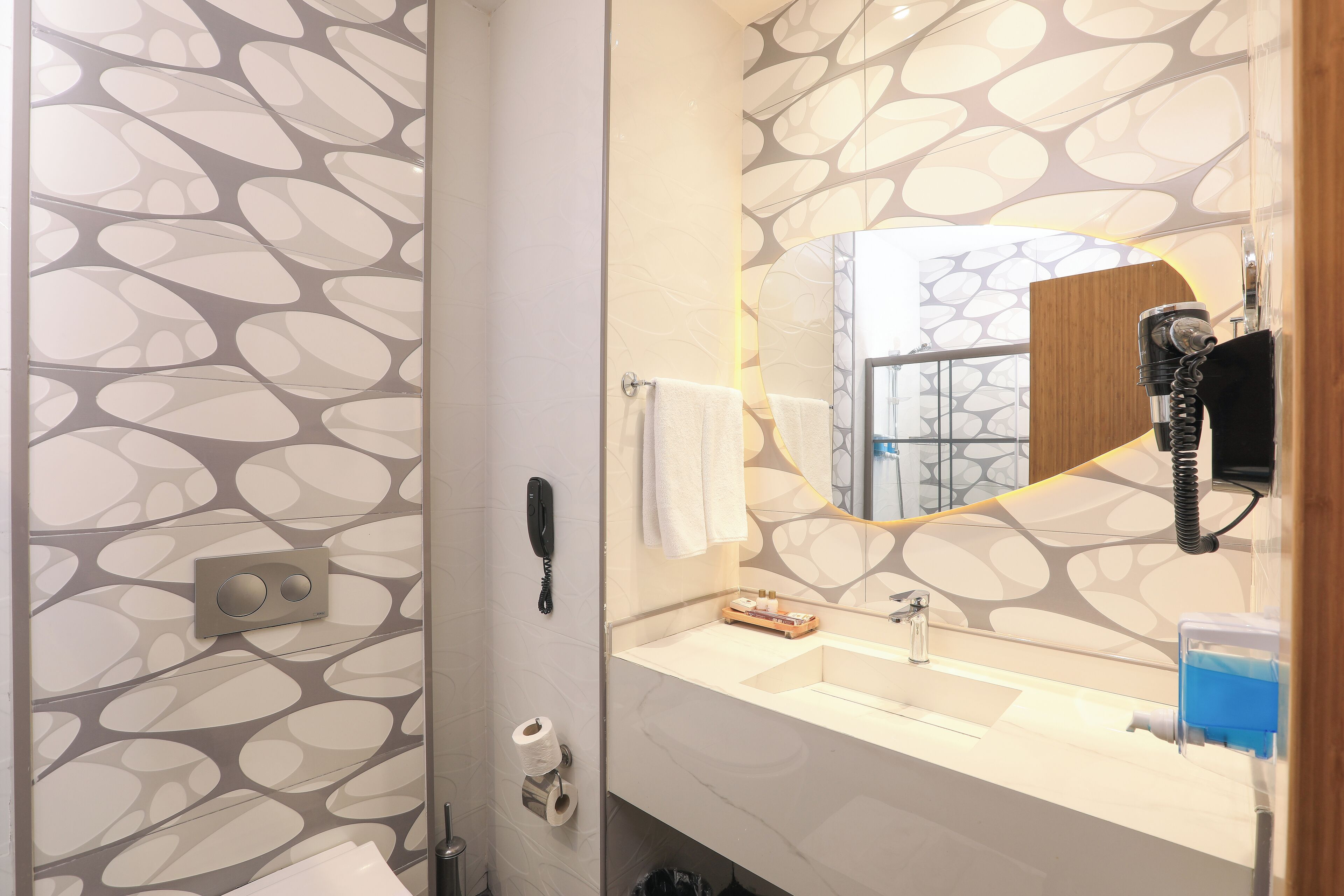 standard room | bathroom | designer toiletries, hair dryer, slippers, towels