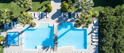 Seasonal outdoor pool, open 9 AM to 7 PM, pool umbrellas, sun loungers