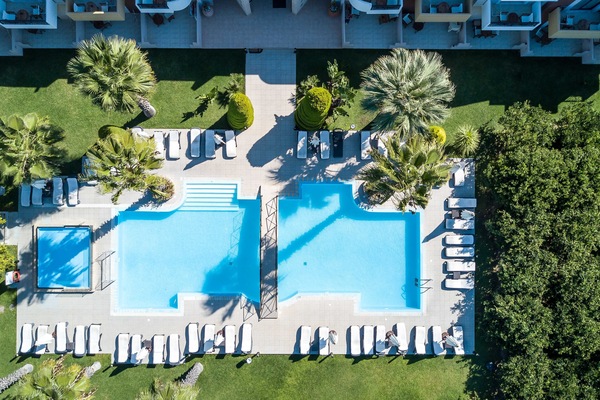 Seasonal outdoor pool, open 9 AM to 7 PM, pool umbrellas, sun loungers