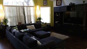 Apartment, 3 Bedrooms, 2 Bathrooms | Living room | Flat-screen TV - Mango Villas at Laguna Bay (Kissimmee)