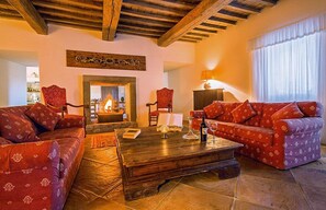 Cottage, 3 Bedrooms | Living room | Flat-screen TV, fireplace - Borgo di Bastia Creti (Umbertide)