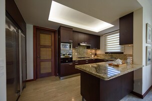 Three Bedroom Suite with Private Jacuzzi (max 6 guests) | Private kitchen | Full-size fridge, microwave, stovetop, dishwasher