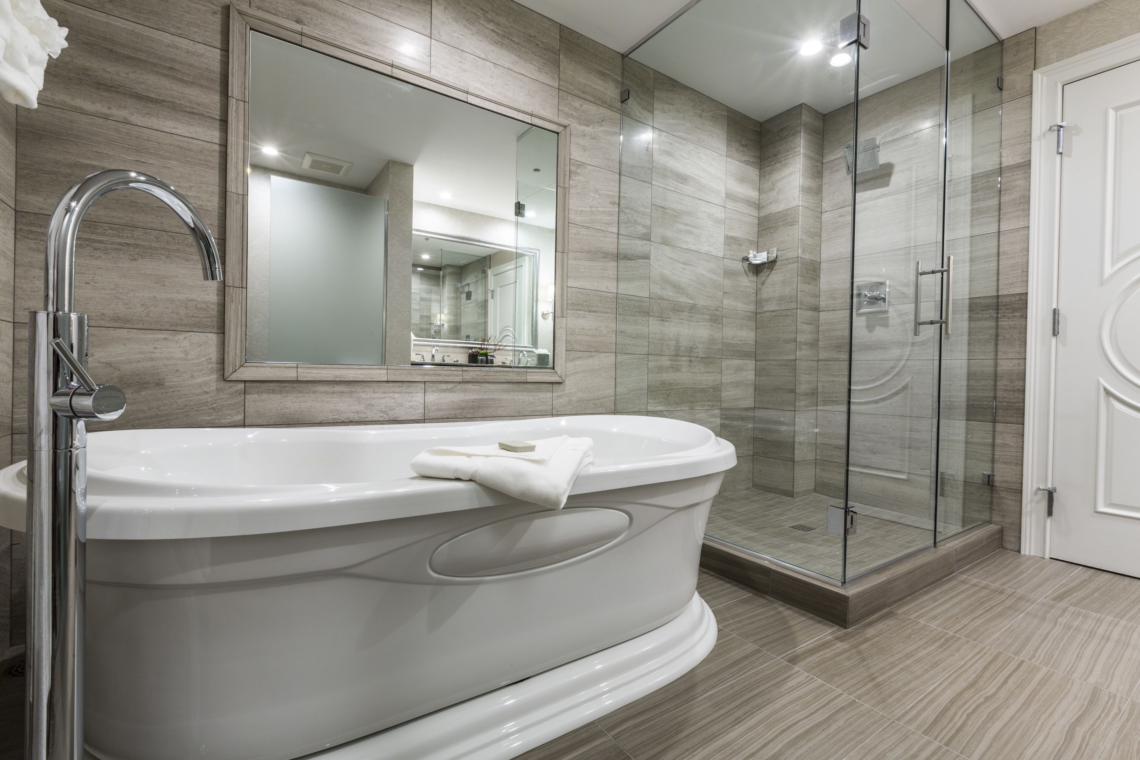 deluxe room, 1 king bed, jetted tub | bathroom | designer toiletries, bathrobes, towels