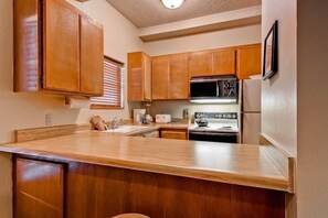 Condo, 2 Bedrooms (Shuttle to Slopes) | Private kitchen