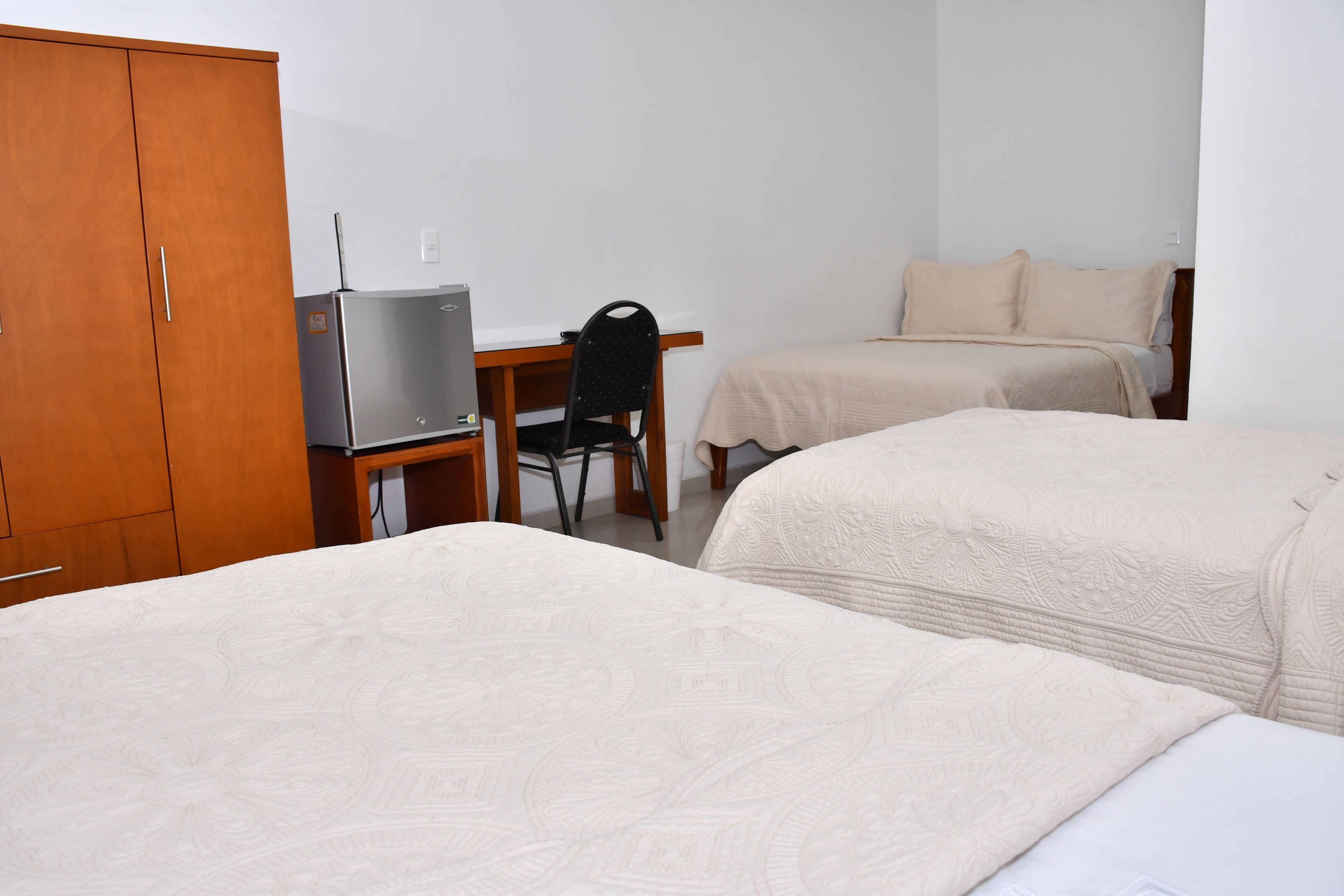 family quadruple room, 1 bedroom | minibar, in-room safe, desk, laptop workspace