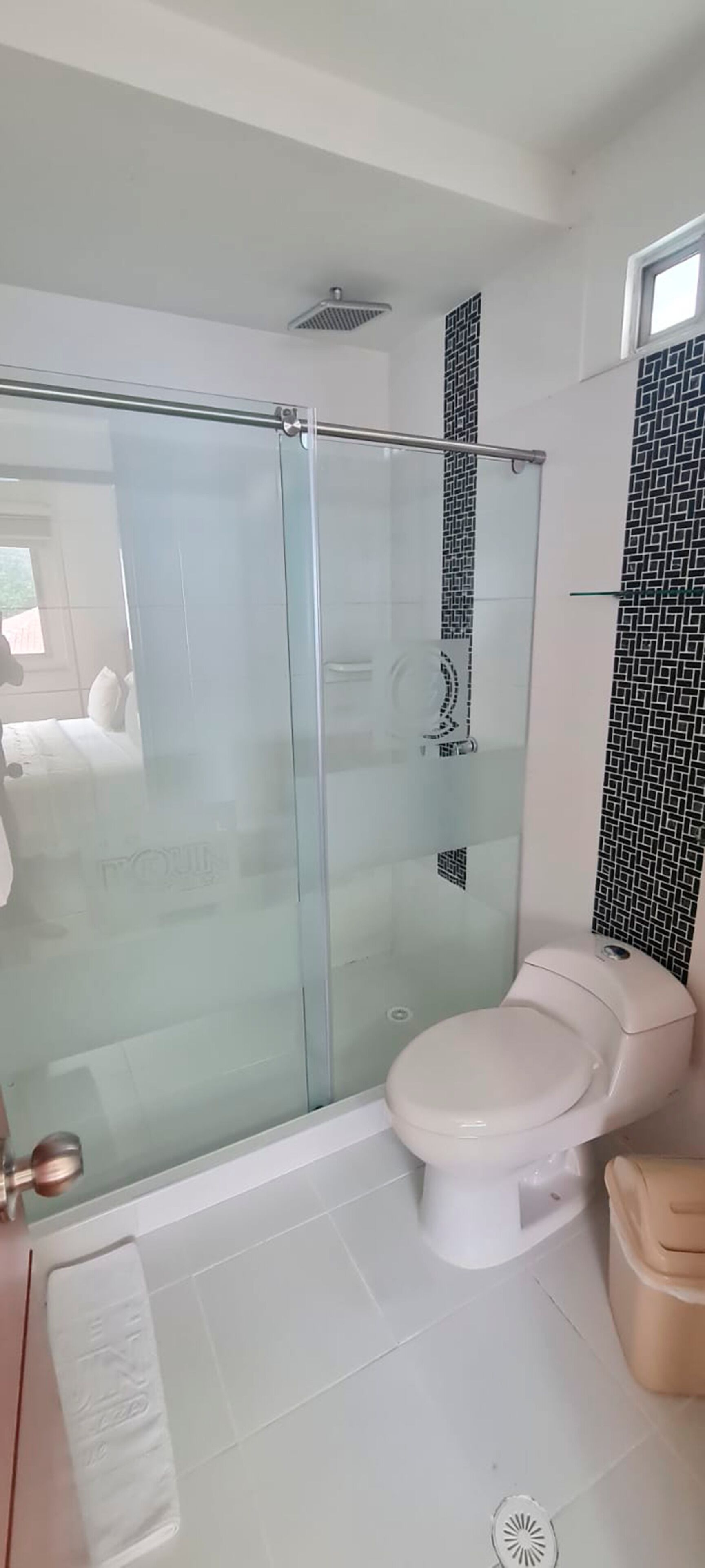 superior quadruple room | bathroom | shower, hair dryer, towels