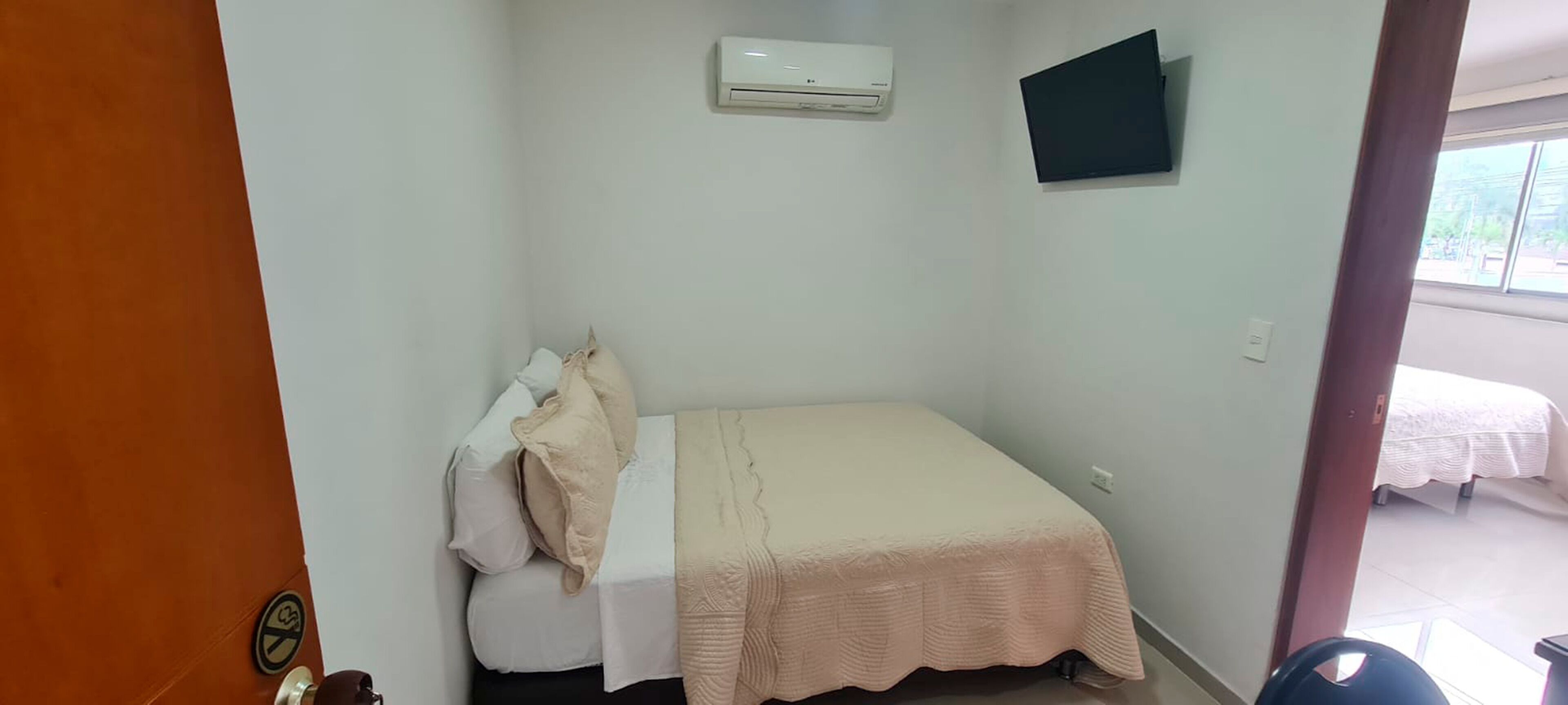 superior quadruple room | minibar, in-room safe, desk, laptop workspace