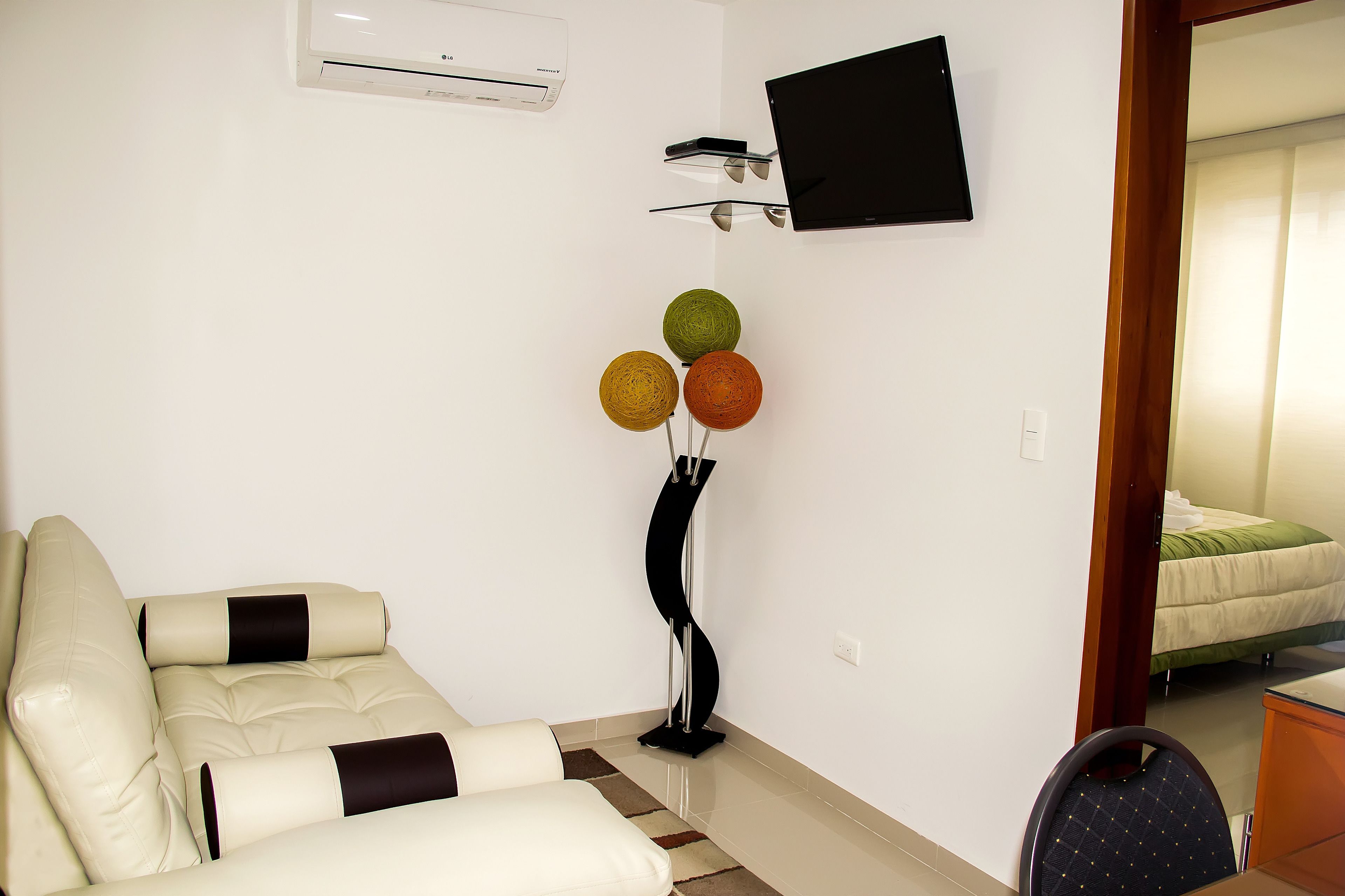 junior suite | living area | 32-inch led tv with cable channels, tv