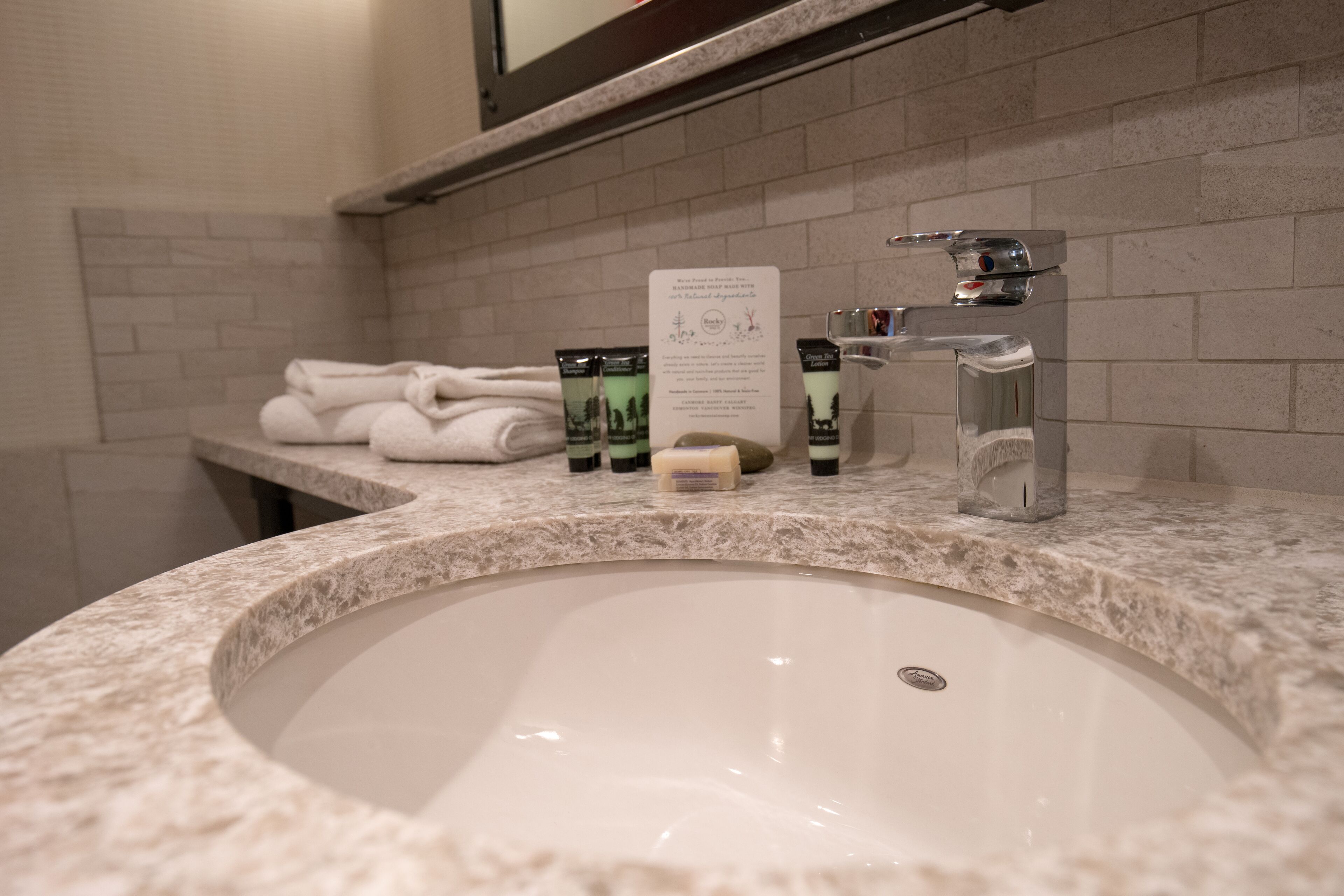 superior king hotel room | bathroom | eco-friendly toiletries, hair dryer, towels, soap