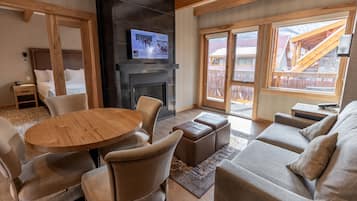 Rooftop 2 Bedroom Suite | Living area | 40-inch flat-screen TV with cable channels, TV