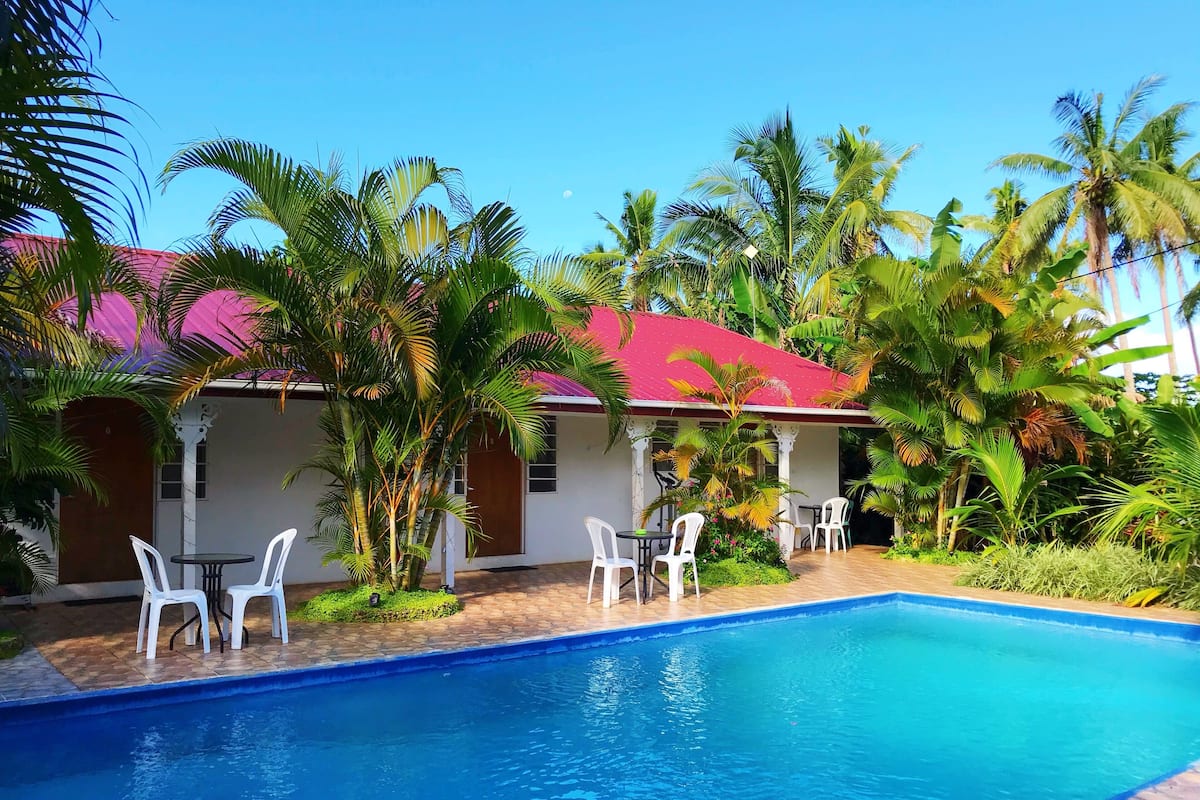 Apartment, 1 Bedroom, Ensuite, Poolside | 1 bedroom, desk, iron/ironing board, bed sheets