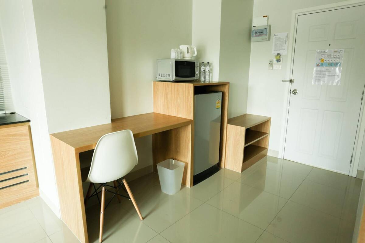 desk, blackout curtains, iron/ironing board