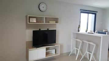 32-inch flat-screen TV with cable channels, TV