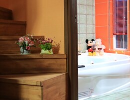 Double Room, Jetted Tub | Living area | Flat-screen TV