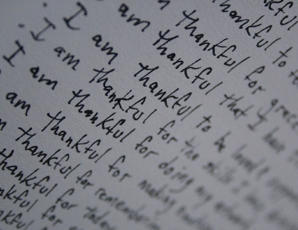 Un gros plan d’un texte manuscrit exprimant de la gratitude.