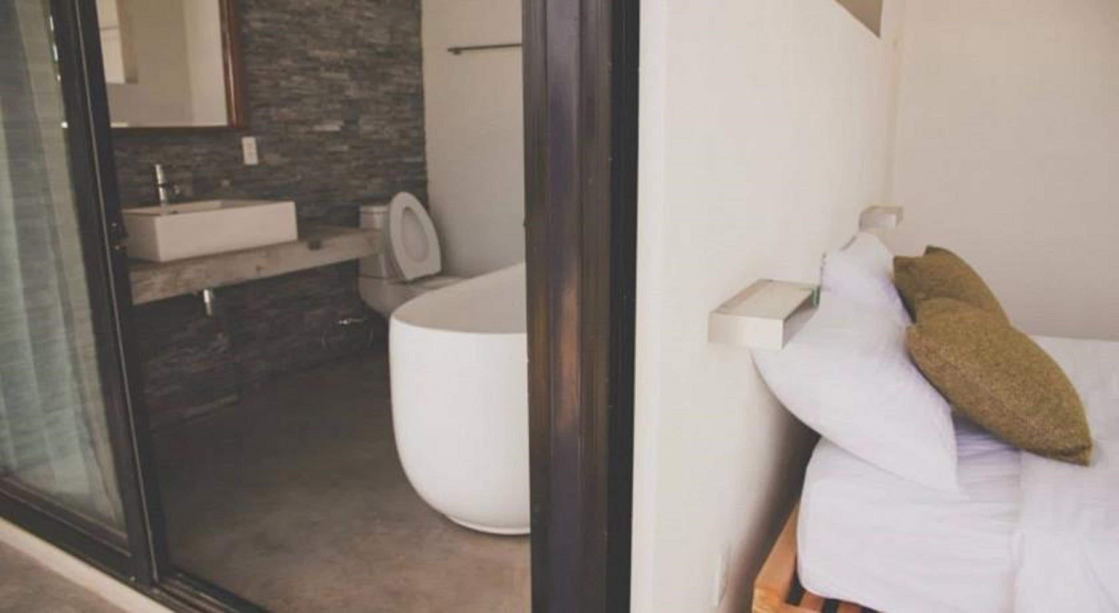 shower, free toiletries, slippers, towels