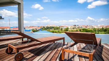 Outdoor pool, pool umbrellas, pool loungers