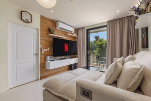 Comfort appartement | Woonruimte | Flatscreentelevisie en een dvd-speler