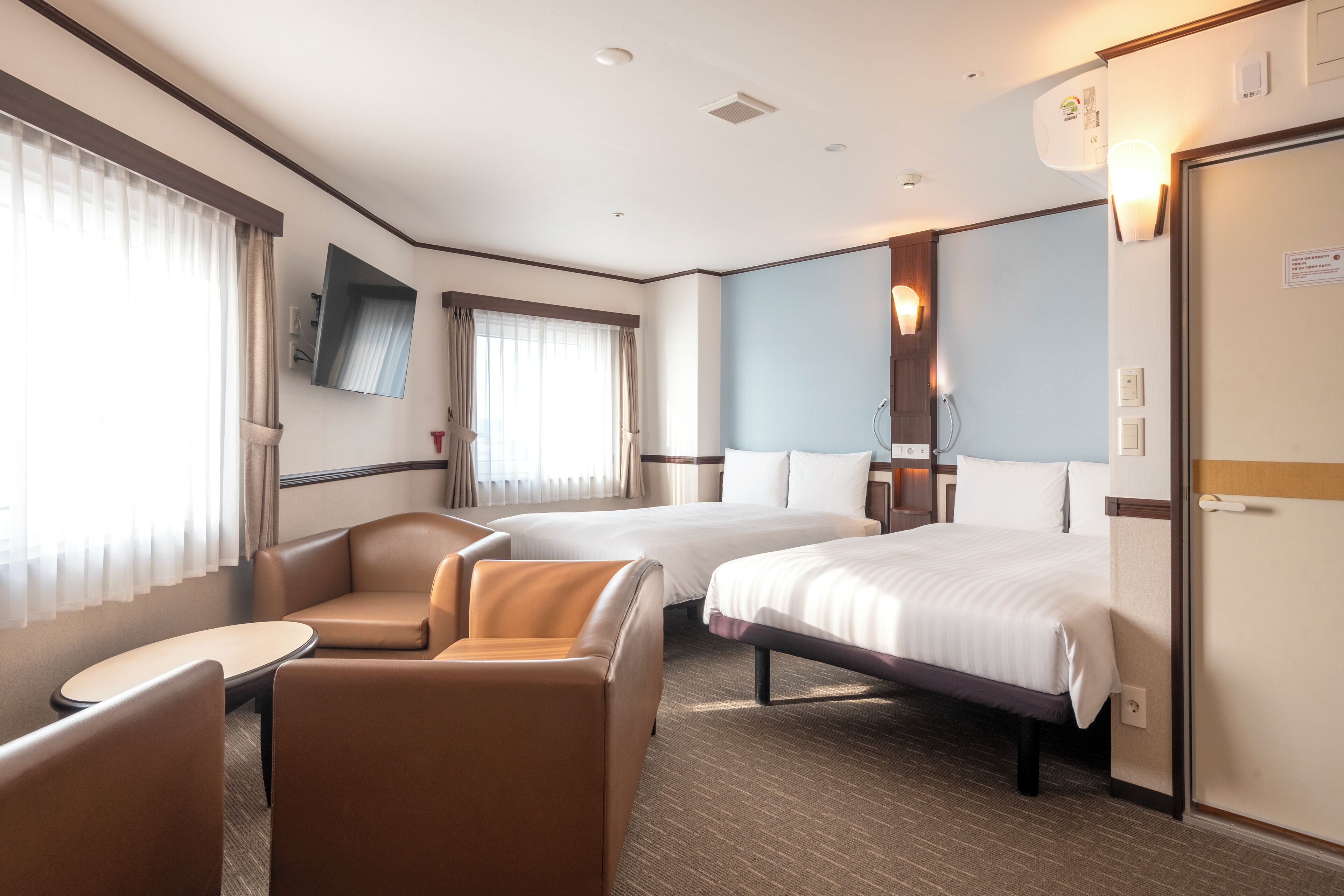 deluxe twin room, non smoking (no parking allowed) | 1 bedroom, down duvets, in-room safe, blackout curtains