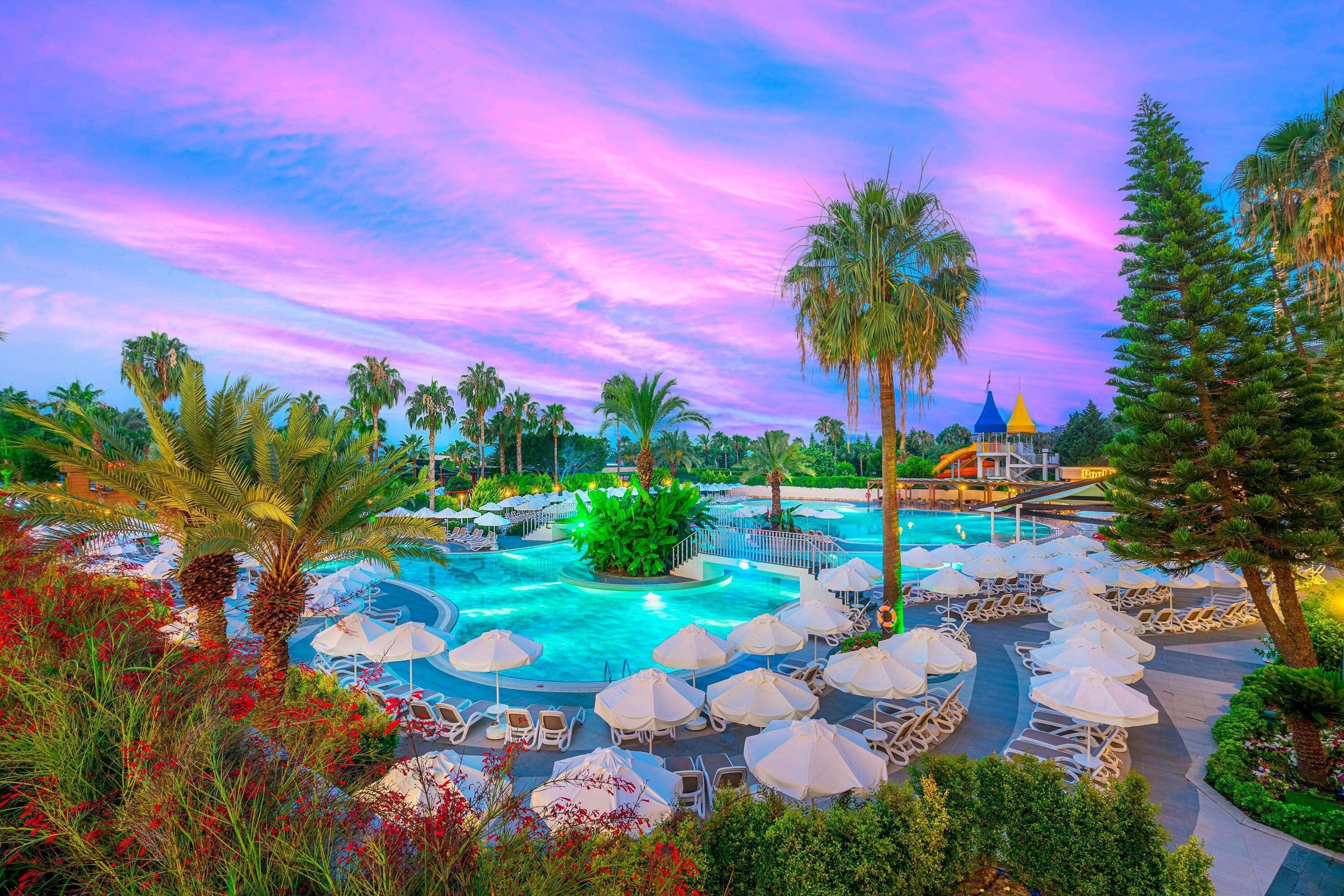 Indoor pool, seasonal outdoor pool, pool umbrellas, sun loungers