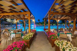 7 bars/lounges, 2 poolside bars, swim-up bar, beach bar