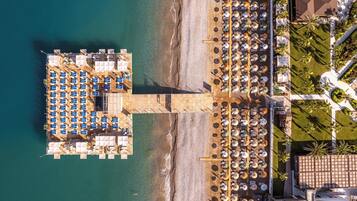 Private beach, sun loungers, beach umbrellas, beach volleyball