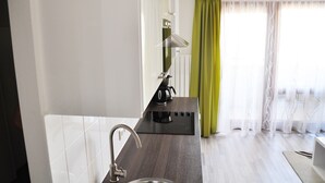 Premium Apartment, 1 Bedroom, Non Smoking, Terrace | Private kitchen | Coffee/tea maker, fridge, microwave, stovetop - Traditional Apartments Vienna TAV (Vienna)