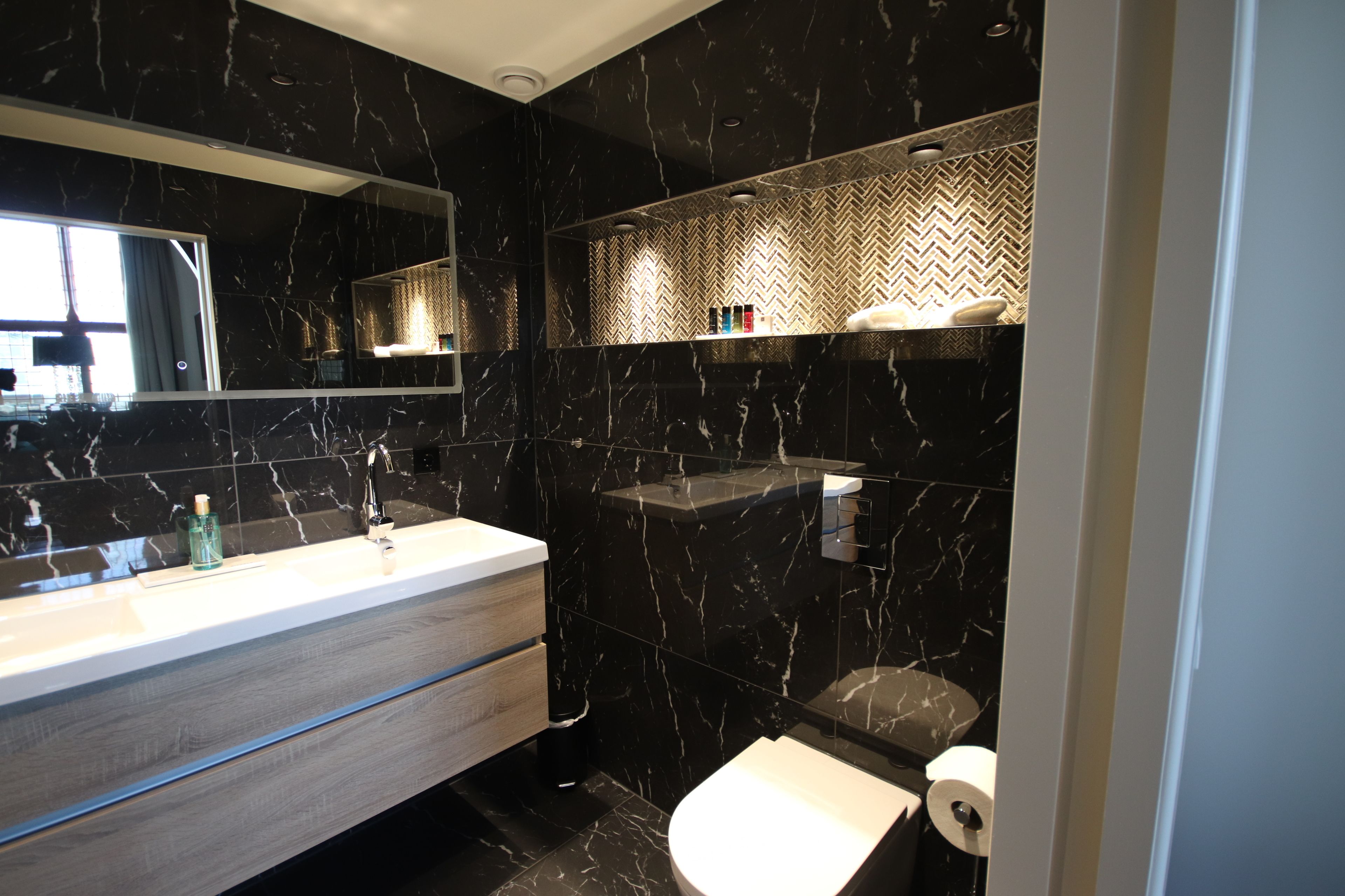 superior suite, 1 king bed, terrace, city view | bathroom | designer toiletries, hair dryer, towels, soap