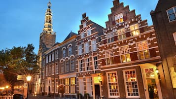 Stunning historic building with a prominent clock tower and traditional architecture.