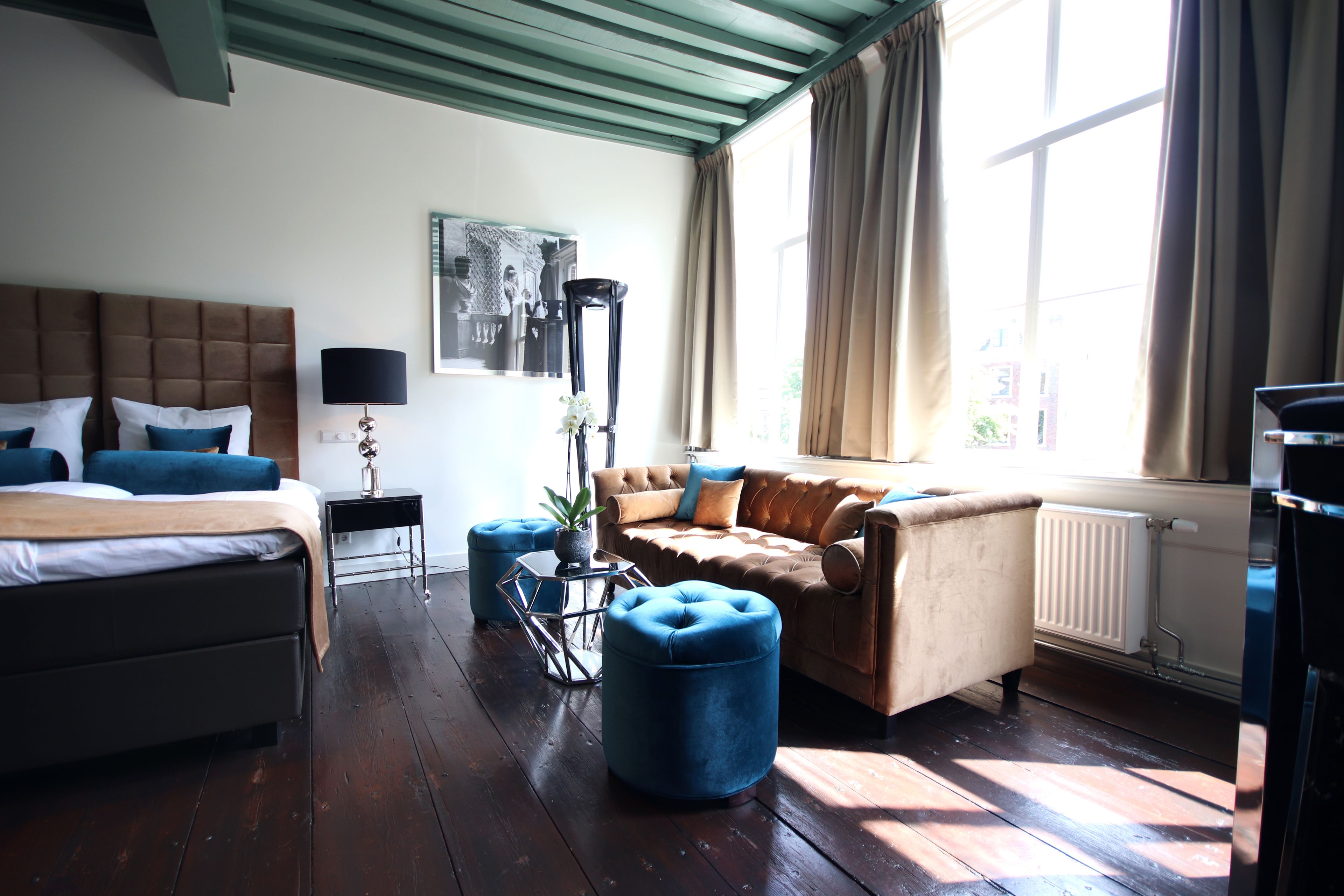 superior suite, 1 king bed, refrigerator, canal view | premium bedding, down duvets, in-room safe, individually decorated