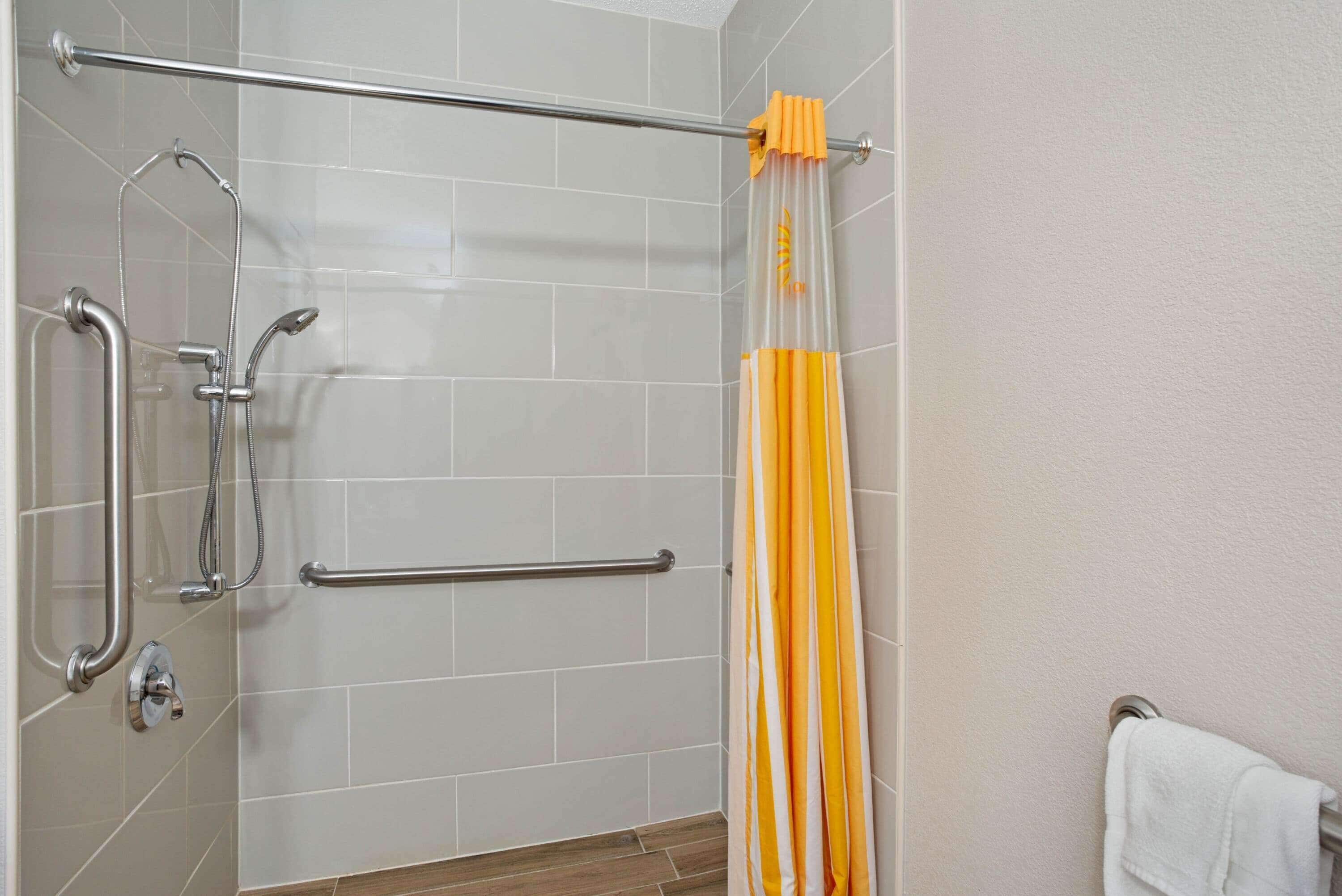 room, 1 king bed, accessible, non smoking (mobility, roll-in shower) | bathroom | combined shower/bathtub, hydromassage showerhead, free toiletries