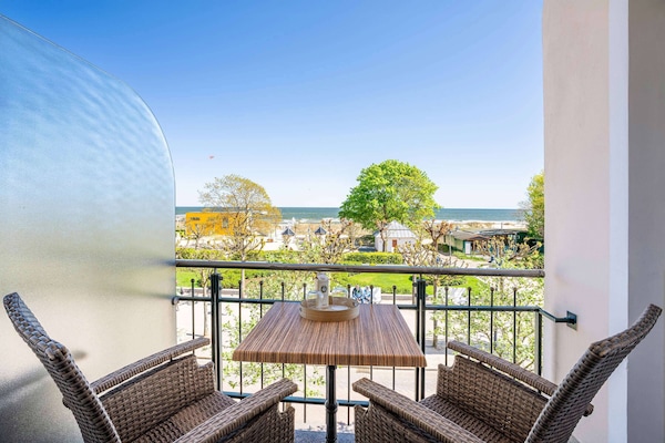 Apartment, 1 Bedroom, Sea View | 1 bedroom, in-room safe, desk, blackout drapes